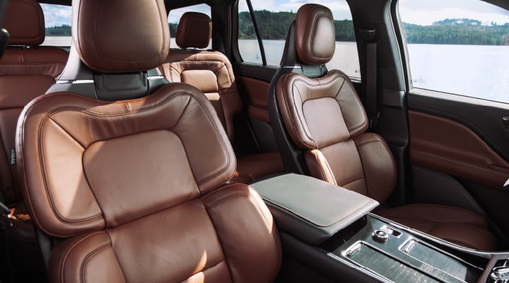 The front row's Perfect Position Seats in a 2024 Lincoln Aviator® Reserve model with Ebony Roast interior | Mark Ficken Lincoln in Charlotte NC